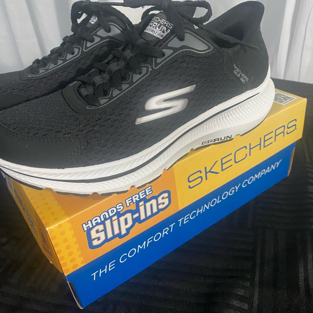 Skechers Women's Black and White Slip-Ins Sneakers